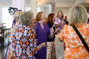 Grace Signs in Purple Dress